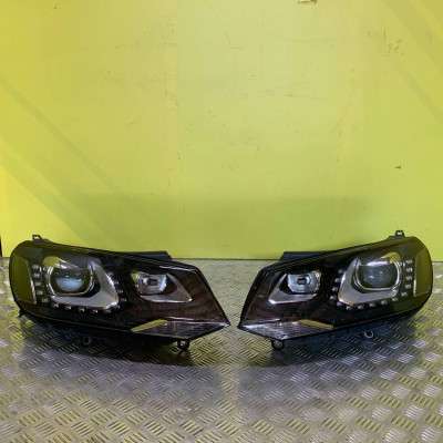 Фара передня ліва Volkswagen Touareg NF (2010-2014)