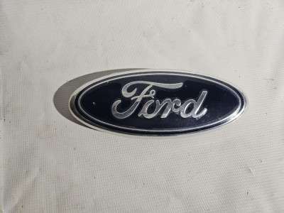 Емблема (значок) Магазин нових запчастин (Ford)