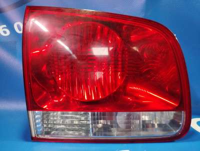 Ліхтар кришки багажника лівий Volkswagen Touareg (2003-2006) дорестайл