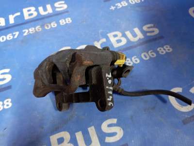 Суппорт задний левый Renault Trafic II, Opel Vivaro II, Nissan Primastar II (2006-2014) рестайл
