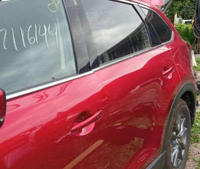 Дверь задняя левая Mazda CX9 (2016-2023)