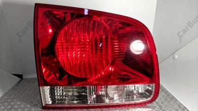 Ліхтар кришки багажника лівий Volkswagen Touareg (2003-2006) дорестайл